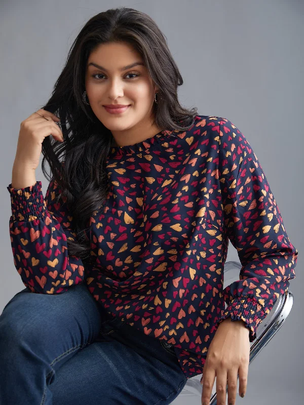 women's tops for those who love to mix and match prints and patternsHearts All Over Ruffled Neckline Blouse